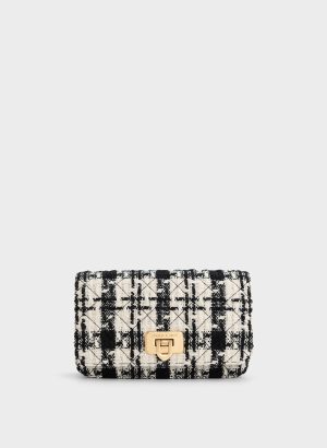 TowBMxjXwYhgJzNE.jpg Cressida Tweed Push-Lock Clutch – Multi